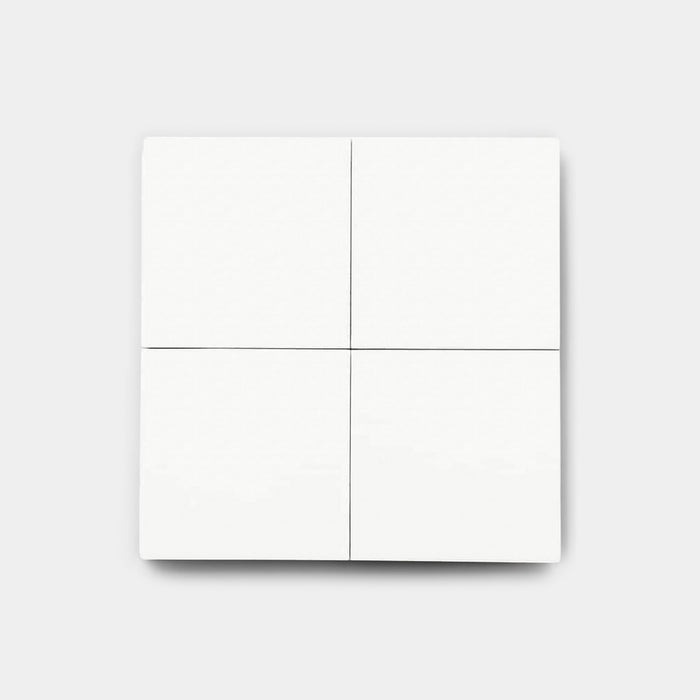 The White 4x4 by vendor-unknown features four white 4x4 cement tiles in a minimalist two-by-two grid on a light gray background, ideal for modern kitchen backsplashes or bathroom tile designs.