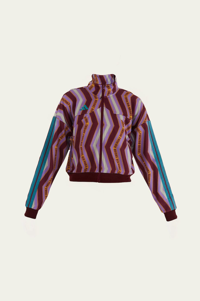 FARM Rio model wearing the Zig Zag Stripes Lilac Adidas Tiro Jacket